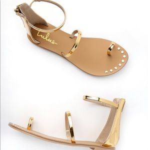 Achilles gold flat ankle strap sandal